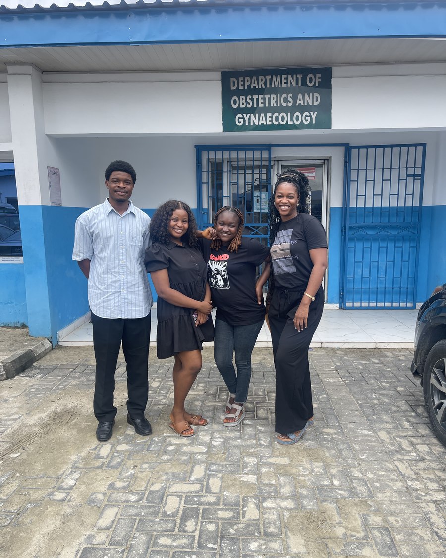 Peace Njoku with the research team outside the Obstetrics and Gynaecology department